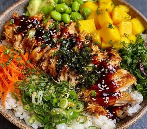 Delicious Sticky Chicken Poke Bowls with fresh ingredients and savory sauce