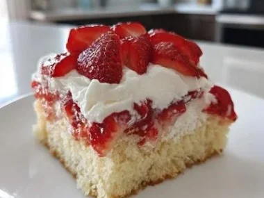 Delicious homemade Strawberry Shortcake Bars on a white plate