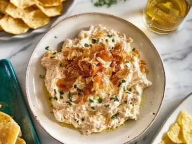 Delicious ultimate caramelized onion dip served with crispy bread