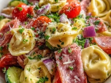 Colorful vibrant tortellini salad with fresh vegetables