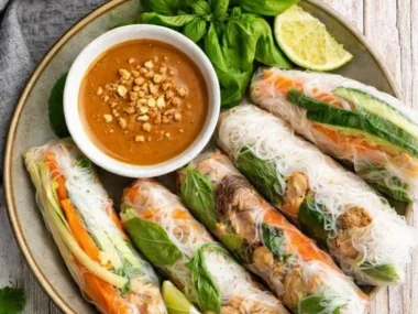 Fresh Vietnamese summer rolls with colorful vegetables and herbs